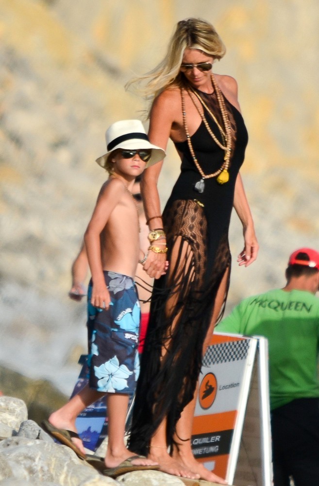 Elle Macpherson - Bikini Candids at the beach in Ibiza